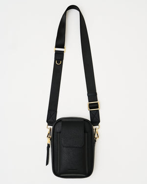 The Kristen Crossbody Genuine Leather Black Bag with Cross Body Nylon Adjustable Shoulder Strap, Phone pocket made to fit all and any iPhone Size with case on with magnetic snap shut closure, main compartment with secure zipper closure and roomy compartment made to fit all essentials, back passport sleeve, and interior compartment. Perfect for any occasion, travel / airport, and everyday wear.