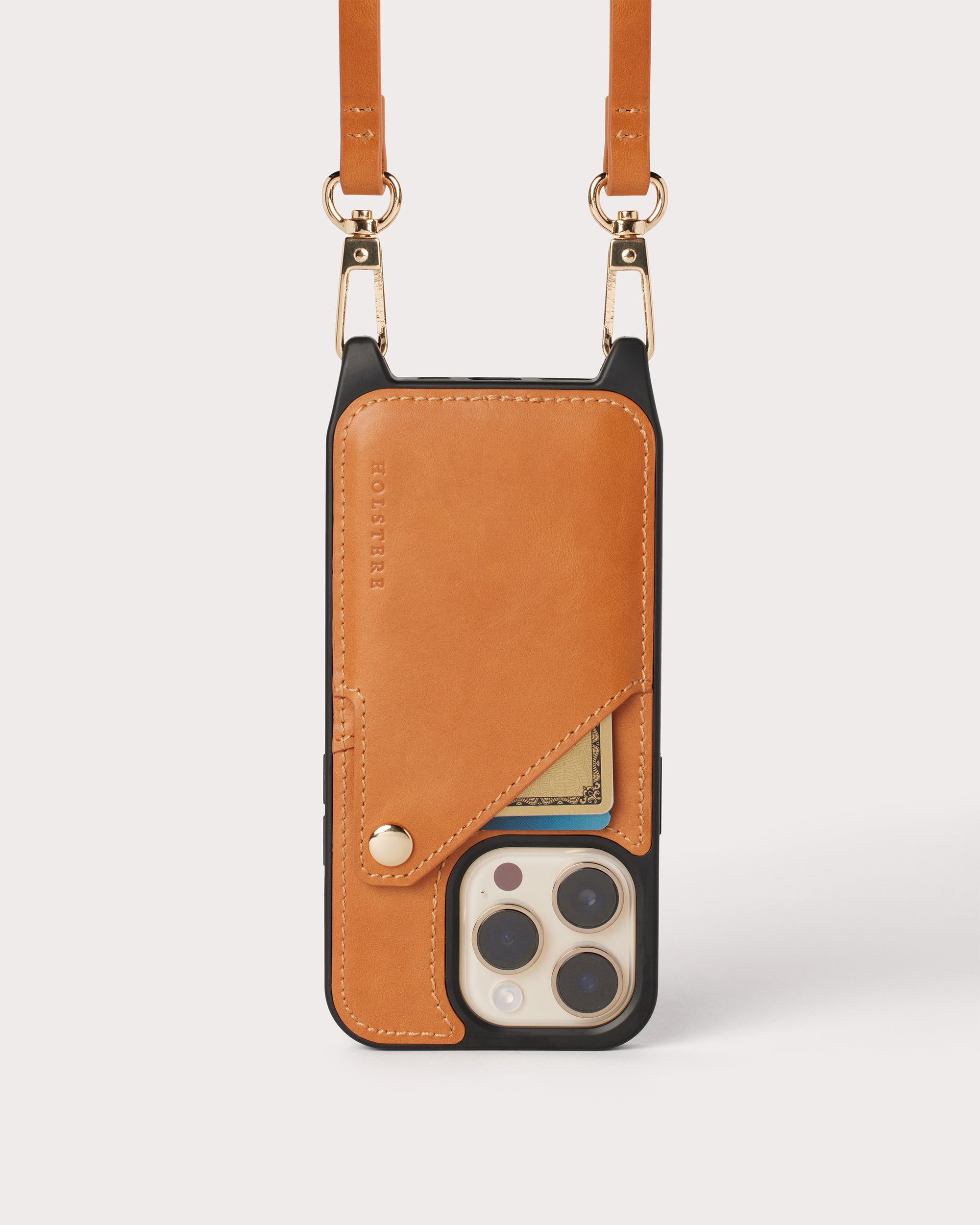Holstere Genuine Leather iPhone Case Crossbody Phone Purse Cross Body Holster Clip for Easy Carry Hands Free - Tan Smooth Vintage Real Genuine Leather Snap In Durable Phone Case with Wallet Credit Card ID Sleeve Pocket, Snap Shut Button, and Adjustable Length Shoulder Strap with Gold Hardware and Clasp. iPhone Leash Necklace for iPhone 14, 14 Pro, 14 Pro Max, 14 Plus